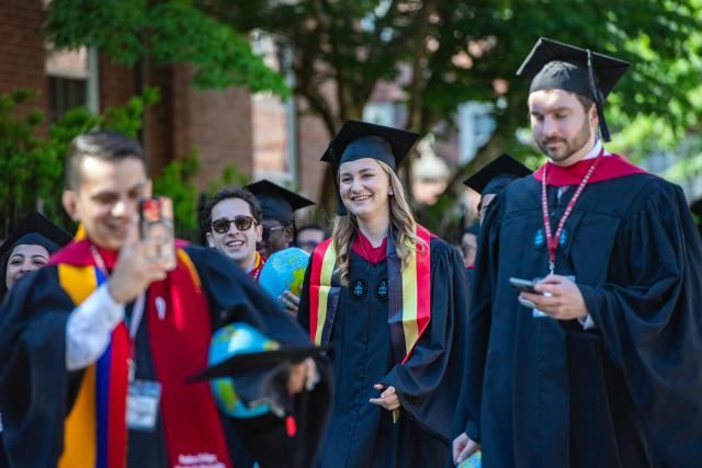 Princess Elisabeth of Belgium, Duchess of Brabant, makes her way with fellow students to Harvard Yard for the 175th Commencement ceremony at Harvard University in Cambridge, Massachusetts, on May 28, 2026. Princess Elisabeth, the heir apparent to the Belgian throne, is graduating with a Master's degree in Public Policy from Harvard Kennedy School. (Photo by Joseph Prezioso / AFP)