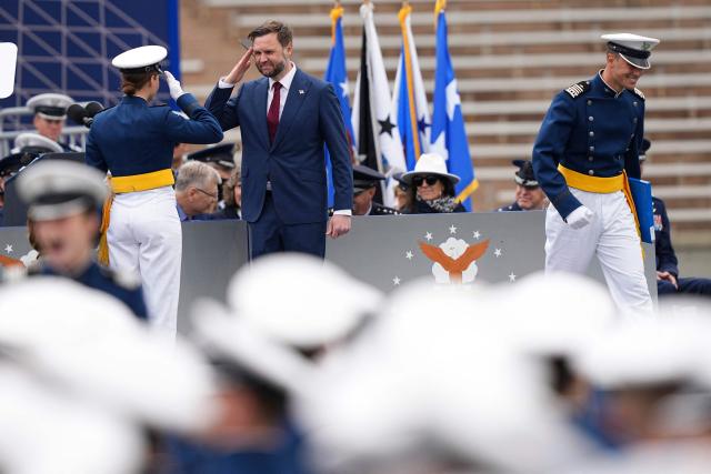 US Vice President JD Vance (C), salutes a graduating cadet during the 2026 graduation ceremony at the US Air Force Academy in Colorado Springs, Colorado, on May 28, 2026. (Photo by Matt Rourke / POOL / AFP)