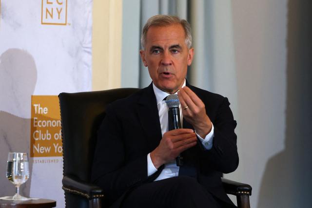 Canadian Prime Minister Mark Carney speaks at the Economic Club in New York on May 28, 2026. (Photo by ANGELA WEISS / AFP)