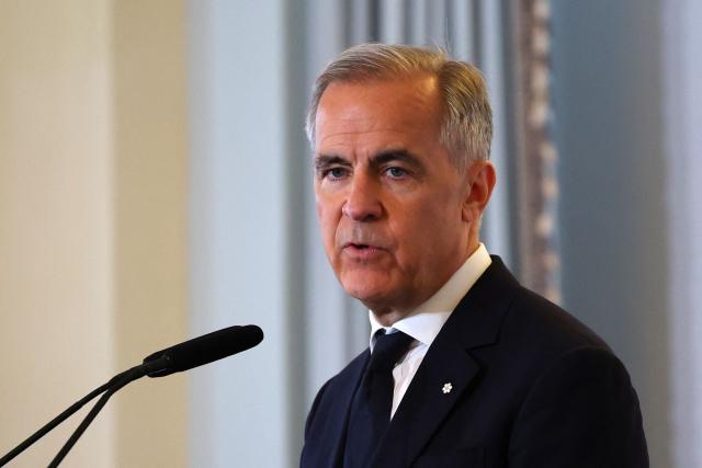 Canadian Prime Minister Mark Carney speaks at the Economic Club in New York on May 28, 2026. (Photo by ANGELA WEISS / AFP)