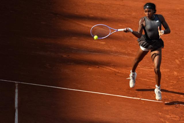 US Coco Gauff plays a forehand return to Egypt's Mayar Sherif during their women's singles match on day 5 of the French Open tennis tournament on Court Suzanne-Lenglen at the Roland-Garros Complex in Paris on May 28, 2026. (Photo by Dimitar DILKOFF / AFP)