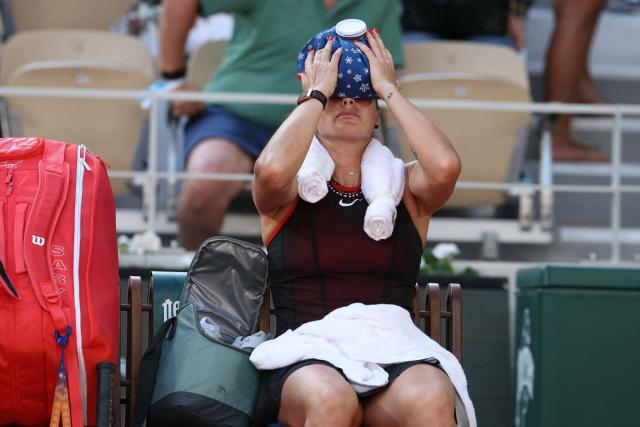 Aryna Sabalenka cools down during a break in play of her women's singles match against France's Elsa Jacquemot on Court Philippe-Chatrier on day 5 of the French Open tennis tournament at the Roland-Garros Complex in Paris on May 28, 2026. (Photo by ALAIN JOCARD / AFP)