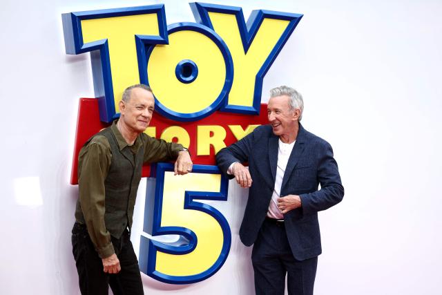 US actor Tom Hanks (L) and US actor Tim Allen (R) pose upon red carpet during the UK launch event of the film 'Toy Story 5' in London on May 28, 2026. (Photo by Henry NICHOLLS / AFP)