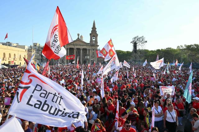 Supporters of Malta’s Labour Party (PL) take part in an election campaign rally in the capital city of Valletta on May 28, 2026. Malta's general elections will be held on May 30 to elect all members of the House of Representatives. (Photo by Alberto PIZZOLI / AFP)