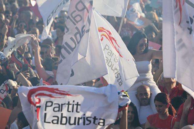 Supporters of Malta’s Labour Party (PL) take part in an election campaign rally in the capital city of Valletta on May 28, 2026. Malta's general elections will be held on May 30 to elect all members of the House of Representatives. (Photo by Alberto PIZZOLI / AFP)