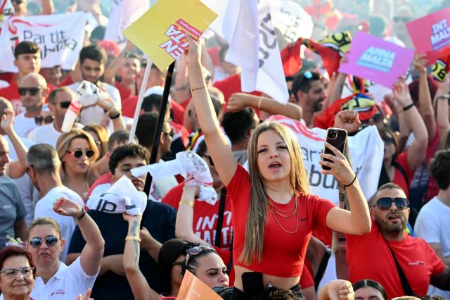 Supporters of Malta’s Labour Party (PL) take part in an election campaign rally in the capital city of Valletta on May 28, 2026. Malta's general elections will be held on May 30 to elect all members of the House of Representatives. (Photo by Alberto PIZZOLI / AFP)