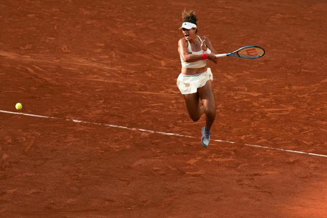 Egypt's Mayar Sherif plays a forehand return to US Coco Gauff during their women's singles match on day 5 of the French Open tennis tournament on Court Suzanne-Lenglen at the Roland-Garros Complex in Paris on May 28, 2026. (Photo by Dimitar DILKOFF / AFP)