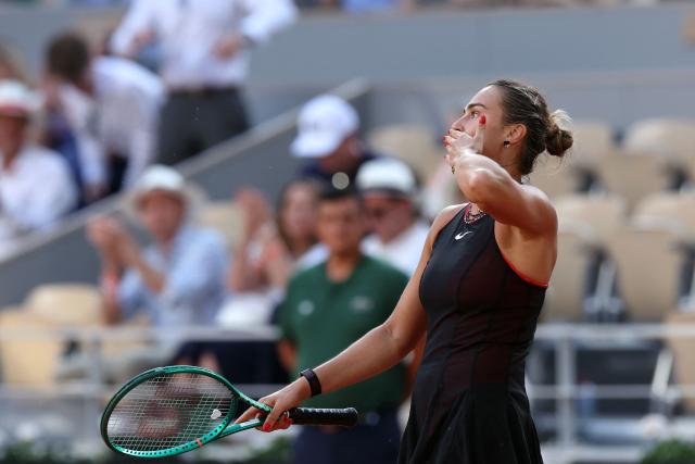 Aryna Sabalenka acknowledges the crowd as she celebrates her victory at the end of her women's singles match against France's Elsa Jacquemot on Court Philippe-Chatrier on day 5 of the French Open tennis tournament at the Roland-Garros Complex in Paris on May 28, 2026. (Photo by ALAIN JOCARD / AFP)
