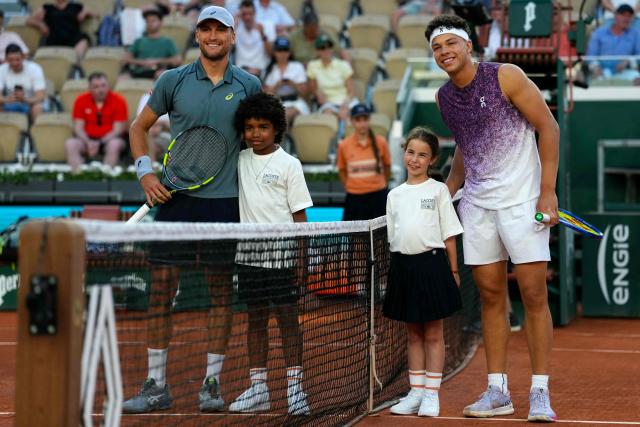 US Ben Shelton (R) and Belgium's Raphael Collignon poses prior their men's singles match on day 5 of the French Open tennis tournament on Court Suzanne-Lenglen at the Roland-Garros Complex in Paris on May 28, 2026. (Photo by Dimitar DILKOFF / AFP)