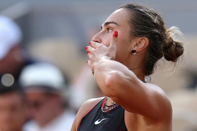 Aryna Sabalenka acknowledges the crowd as she celebrates her victory at the end of her women's singles match against France's Elsa Jacquemot on Court Philippe-Chatrier on day 5 of the French Open tennis tournament at the Roland-Garros Complex in Paris on May 28, 2026. (Photo by ALAIN JOCARD / AFP)