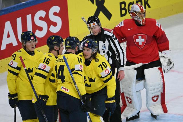 Sweden's forward #70 Oskar Sundqvist (C) celebrates scoring his team's second goal during the IIHF Ice Hockey Men's World Championship quarter-final match between Switzerland and Sweden at the Swiss Life Arena in Zurich, on May 28, 2026. (Photo by SEBASTIEN BOZON / AFP)