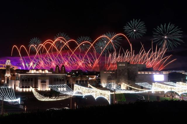 Fireworks illuminate the sky over Katara Cultural Village in Doha on May 28, 2026 on the second day of Eid al-Adha, the Feast of Sacrifice, which marks the end of the annual Hajj pilgrimage to Mecca and commemorates the Prophet Abraham's willingness to sacrifice his son in obedience to God. (Photo by Karim JAAFAR / AFP)