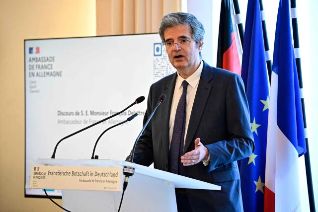 France's ambassador to Germany Franзois Delattre delivers a speech at a ceremony at the French embassy in Berlin, during which three German cultural institutions hand over seven books to the descendants of Marc Bloch (1886–1944) and his wife Simonne Vidal (1894–1944), on May 28, 2026. Marc Bloch, a member of the Resistance, was executed by the Gestapo on June 16, 1944. The restitution of the books was organized by the Berlin State Library – Prussian Cultural Heritage, with the support of the French Commission for the Restitution of Cultural Property and Compensation for the Victims of Anti-Semitic Expropriations (CIVS). (Photo by Tobias SCHWARZ / AFP)
