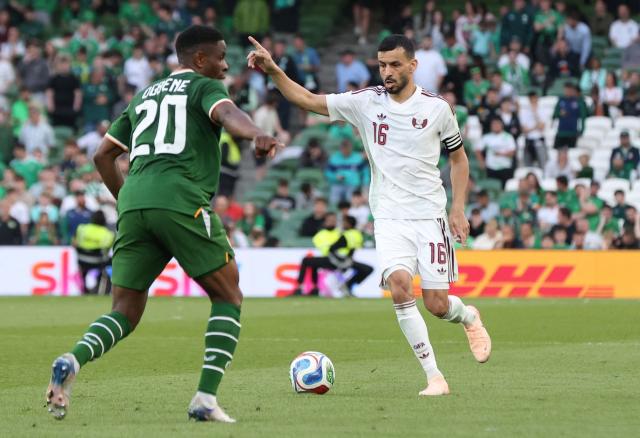 Qatar's Defender #16 Boualem Khoukhi runs with the ball during the international friendly football match between the Republic of Ireland and Qatar, at the Aviva Stadium in Dublin, Ireland on May 28, 2026. (Photo by Paul Faith / AFP)