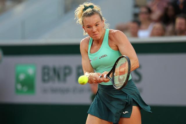 Czech Republic's Katerina Siniakova plays a backhand return to Canada's Victoria Mboko during their women's singles match on day 5 of the French Open tennis tournament on Court Simonne-Mathieu at the Roland-Garros Complex in Paris on May 28, 2026. (Photo by Thomas SAMSON / AFP)