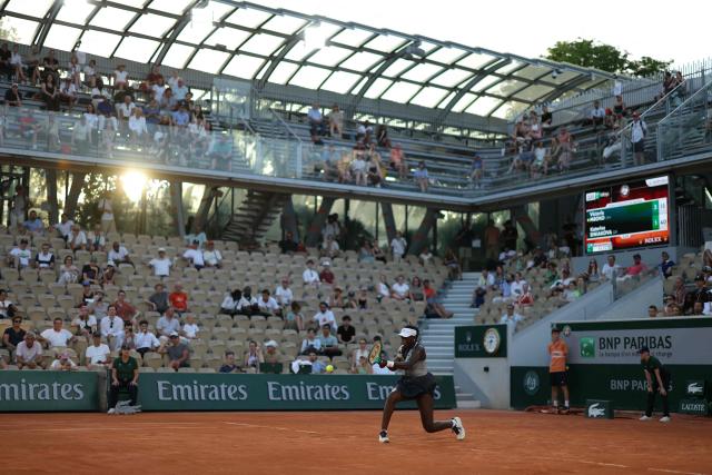 Canada's Victoria Mboko plays a backhand return to Czech Republic's Katerina Siniakova during their women's singles match on day 5 of the French Open tennis tournament on Court Simonne-Mathieu at the Roland-Garros Complex in Paris on May 28, 2026. (Photo by Thomas SAMSON / AFP)