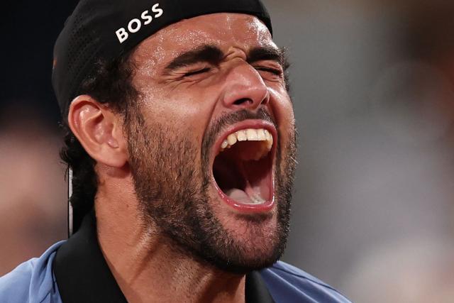 Italy's Matteo Berrettini celebrates his victory at the end of his men's singles match against France's Arthur Rinderknech on day 5 of the French Open tennis tournament on Court Philippe-Chatrier at the Roland-Garros Complex in Paris on May 28, 2026. (Photo by Anne-Christine POUJOULAT / AFP)