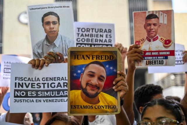 Relatives of political prisoners protest outside the Public Prosecutor's Office in Caracas on May 28, 2026, calling for the release of their loved ones. (Photo by Juan BARRETO / AFP)