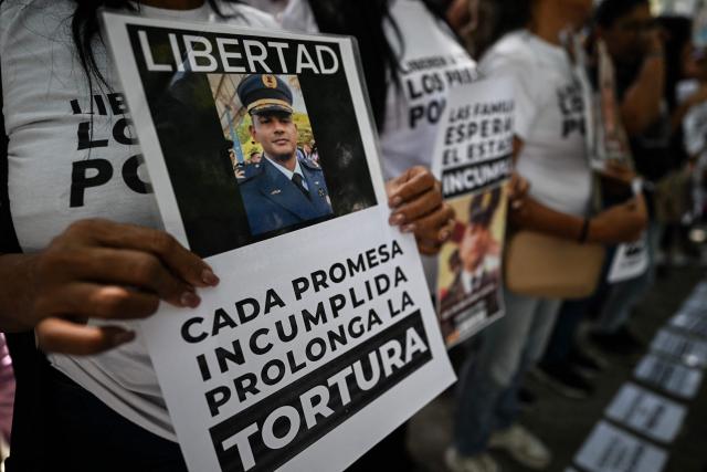 Relatives of political prisoners protest outside the Public Prosecutor's Office in Caracas on May 28, 2026, calling for the release of their loved ones. (Photo by Juan BARRETO / AFP)