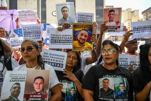 Relatives of political prisoners protest outside the Public Prosecutor's Office in Caracas on May 28, 2026, calling for the release of their loved ones. (Photo by Juan BARRETO / AFP)