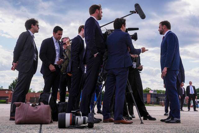 US Vice President JD Vance (R) speaks with reporters after his arrival at Joint Base Andrews in Maryland, on May 28, 2026 on his return from Colorado where he attended the 2026 graduation ceremony at the US Air Force Academy. (Photo by Matt Rourke / POOL / AFP)