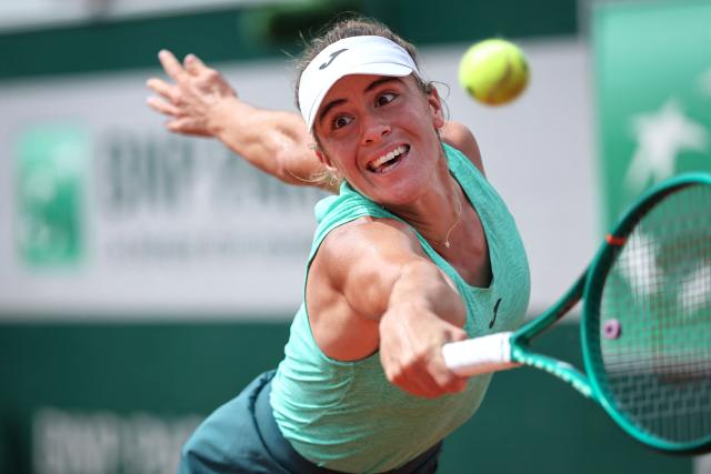 Argentina's Solana Sierra plays a backhand return to Romania's Sorana Cirstea during their women's singles match on day 6 of the French Open tennis tournament at the Roland-Garros Complex in Paris on May 29, 2026. (Photo by Anne-Christine POUJOULAT / AFP)