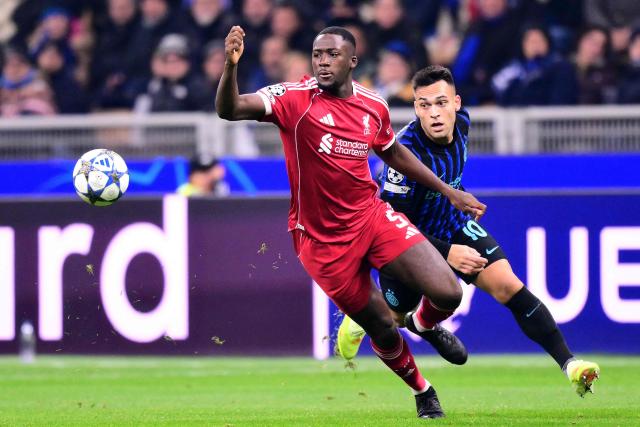 (FILES) Inter Milan's Argentinian forward #10 Lautaro Martinez fights for the ball with Liverpool's French defender #05 Ibrahima Konate during the UEFA Champions League phase day 6 football match between Inter Milan and Liverpool at San Siro stadium in Milan, on December 9, 2025. France defender Ibrahima Konate is to leave Liverpool when his contract expires next month after failing to agree a new deal, according to multiple reports in the British media on Friday, May 29. (Photo by Stefano RELLANDINI / AFP)