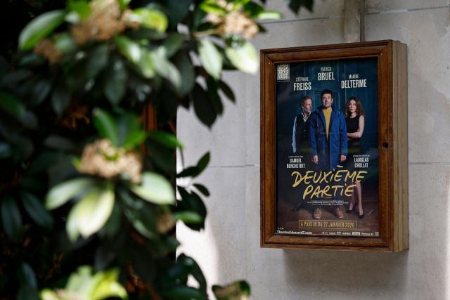 This photograph shows a theatre poster of a play entitled "Deuxieme Partie" starring French singer and actor Patrick Bruel displayed on the facade of the Theatre Edouard VII in Paris on May 29, 2026. A performance of the play "Deuxieme Partie" was briefly disrupted on the evening of May 27, 2026 in Paris by activists from the feminist collective Nous Toutes who had taken their seats in the Theatre Edouard VII, according to videos posted on social media. Patrick Bruel is currently facing four rape allegations in France and a judicial investigation into sexual assault in Belgium. He denies all the allegations against him. (Photo by SIMON WOHLFAHRT / AFP)