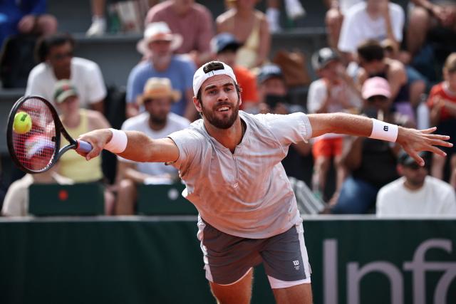 Karen Khachanov plays a forehand return to Netherlands' Jesper de Jong during their men's singles match on day 6 of the French Open tennis tournament at the Roland-Garros Complex in Paris on May 29, 2026. (Photo by Anne-Christine POUJOULAT / AFP)