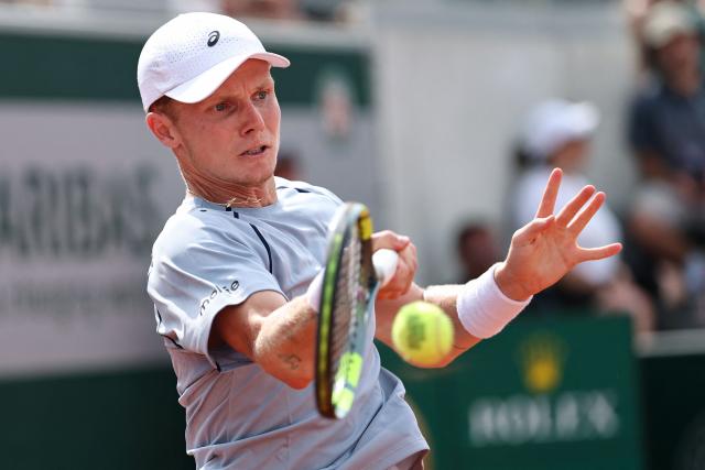 Netherlands' Jesper de Jong plays a forehand return to Karen Khachanov during their men's singles match on day 6 of the French Open tennis tournament at the Roland-Garros Complex in Paris on May 29, 2026. (Photo by Anne-Christine POUJOULAT / AFP)