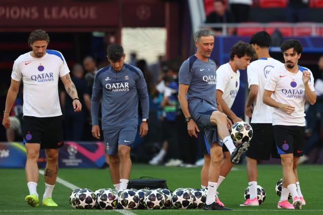 Paris Saint-Germain's Spanish headcoach Luis Enrique (C) controls hte ball as he oversees a MD-1 training session of his players on May 29, 2026, the eve of the UEFA Champions League final football match between Paris Saint-Germain (PSG) and Arsenal at the Puskas Arena in Budapest. Paris Saint-Germain (PSG) face Arsenal in the UEFA Champions League final football match on May 30, 2026 in Budapest. (Photo by FRANCK FIFE / AFP)