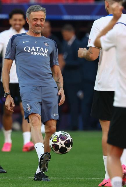 Paris Saint-Germain's Spanish headcoach Luis Enrique controls hte ball as he oversees a MD-1 training session of his players on May 29, 2026, the eve of the UEFA Champions League final football match between Paris Saint-Germain (PSG) and Arsenal at the Puskas Arena in Budapest. Paris Saint-Germain (PSG) face Arsenal in the UEFA Champions League final football match on May 30, 2026 in Budapest. (Photo by FRANCK FIFE / AFP)