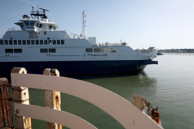 This photograph shows a view of the ferry "L'Estuaire" connecting Le Verdon-sur-Mer (Gironde) to Royan (Charente-Maritime) during an anti-drug trafficking operation, off the coast of Royan, south-western France on May 29, 2026. (Photo by ROMAIN PERROCHEAU / AFP)
