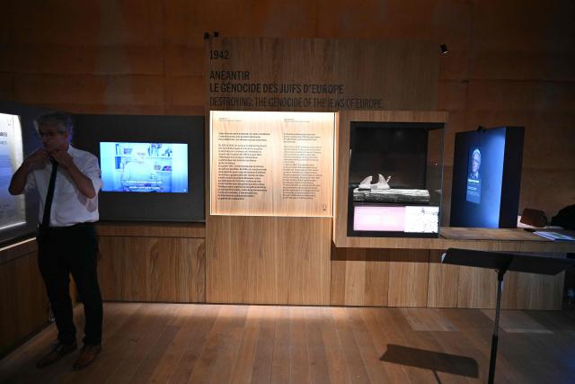 This photograph shows the museum part of the Rivesaltes Camp Memorial inaugurated in October 2015 and built amidst the remains of the barracks, witnesses to the fate of more than 60,000 people on May 29, 2026 in Rivesaltes, southwestern France. Ten years after it opened, the Rivesaltes Camp Memorial Museum, a site that, throughout the 20th century, housed Spanish refugees, Jews, Roma and Harkis, is revamping its permanent exhibition, aiming to serve as a "bulwark" against tensions surrounding remembrance. (Photo by Lionel BONAVENTURE / AFP)