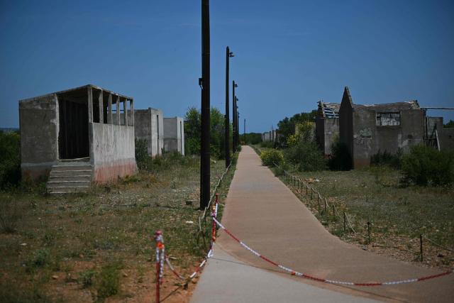 This photograph shows the Rivesaltes Camp Memorial inaugurated in October 2015 and built amidst the remains of the barracks, witnesses to the fate of more than 60,000 people on May 29, 2026 in Rivesaltes, southwestern France. Ten years after it opened, the Rivesaltes Camp Memorial Museum, a site that, throughout the 20th century, housed Spanish refugees, Jews, Roma and Harkis, is revamping its permanent exhibition, aiming to serve as a "bulwark" against tensions surrounding remembrance. (Photo by Lionel BONAVENTURE / AFP)