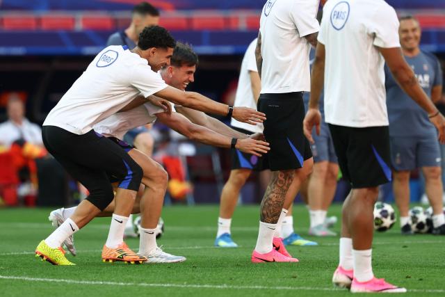 Paris Saint-Germain's Moroccan defender #02 Achraf Hakimi (L) and Paris Saint-Germain's Spanish midfielder #08 Fabian Ruiz take part in a MD-1 training session of his players on May 29, 2026, the eve of the UEFA Champions League final football match between Paris Saint-Germain (PSG) and Arsenal at the Puskas Arena in Budapest. Paris Saint-Germain (PSG) face Arsenal in the UEFA Champions League final football match on May 30, 2026 in Budapest. (Photo by FRANCK FIFE / AFP)