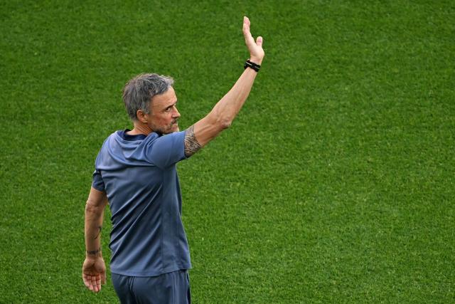 Paris Saint-Germain's Spanish head coach Luis Enrique waves as he attends a MD-1 training session of his players on May 29, 2026, the eve of the UEFA Champions League final football match between Paris Saint-Germain (PSG) and Arsenal at the Puskas Arena in Budapest. Paris Saint-Germain (PSG) face Arsenal in the UEFA Champions League final football match on May 30, 2026 in Budapest. (Photo by NICOLAS TUCAT / AFP)