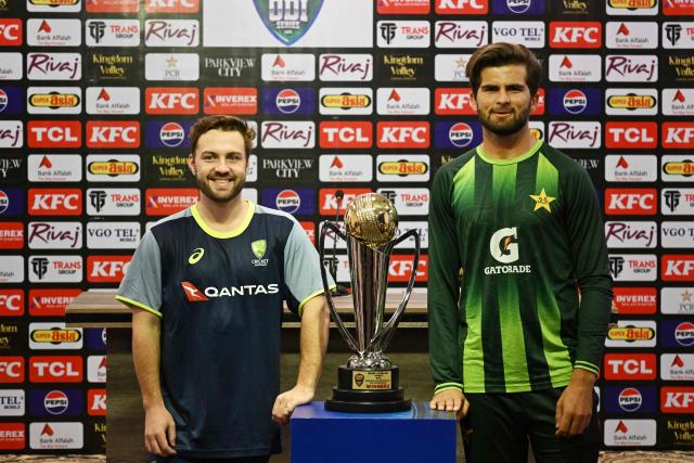 Pakistan's captain Shaheen Shah Afridi (R) and his Australian counterpart Josh Inglis pose with the ODI series trophy during a ceremony at Rawalpindi Cricket Stadium in Rawalpindi on May 29, 2026, ahead of the opening One-Day International between Pakistan and Australia. (Photo by Farooq NAEEM / AFP)