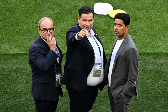 (LtoR) Paris Saint Germain's Portuguese Football Advisor Luis Campos, Daniel Markham and Paris Saint Germain's Qatari president Nasser al-Khelaifi attend a MD-1 training session of Paris Saint-Germain (PSG) at the Puskas Arena in Budapest on May 29, 2026, the eve of the UEFA Champions League final football match between Paris Saint-Germain (PSG) and Arsenal. Paris Saint-Germain (PSG) face Arsenal in the UEFA Champions League final football match on May 30, 2026 in Budapest. (Photo by NICOLAS TUCAT / AFP)