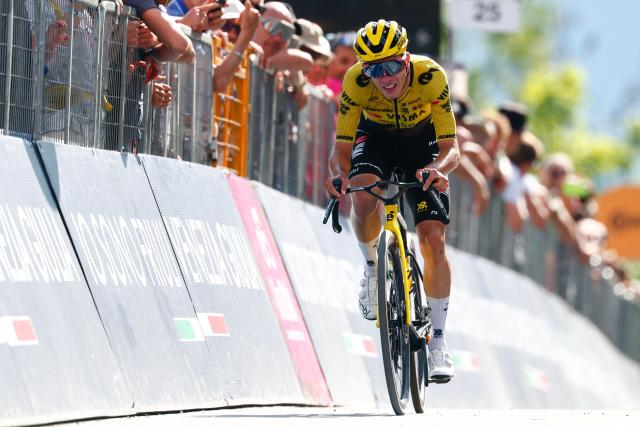 Team Visma Lease a Bike Italian rider Davide Piganzoli crosses the finish line of the 19th stage of the Giro d'Italia 2026 - Tour of Italy cycling race between Feltre and Alleghe, Italy, on May 29, 2026. (Photo by Luca Bettini / AFP)