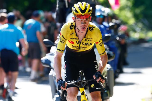 Team Visma Lease a Bike US rider Sepp Kuss cycles in a lone breakaway in the final ascent to win the 19th stage of the Giro d'Italia 2026 - Tour of Italy cycling race between Feltre and Alleghe, Italy, on May 29, 2026. (Photo by Luca Bettini / AFP)