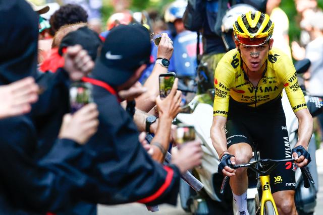 Team Visma Lease a Bike US rider Sepp Kuss cycles in a lone breakaway in the final ascent to win the 19th stage of the Giro d'Italia 2026 - Tour of Italy cycling race between Feltre and Alleghe, Italy, on May 29, 2026. (Photo by Luca Bettini / AFP)