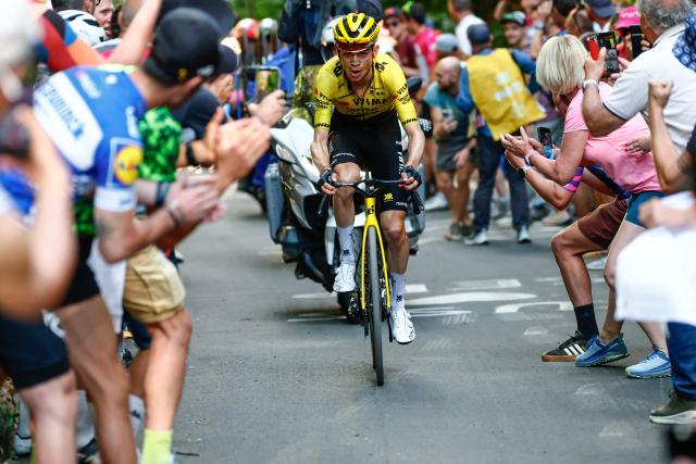 Team Visma Lease a Bike US rider Sepp Kuss cycles in a lone breakaway in the final ascent to win the 19th stage of the Giro d'Italia 2026 - Tour of Italy cycling race between Feltre and Alleghe, Italy, on May 29, 2026. (Photo by Luca Bettini / AFP)