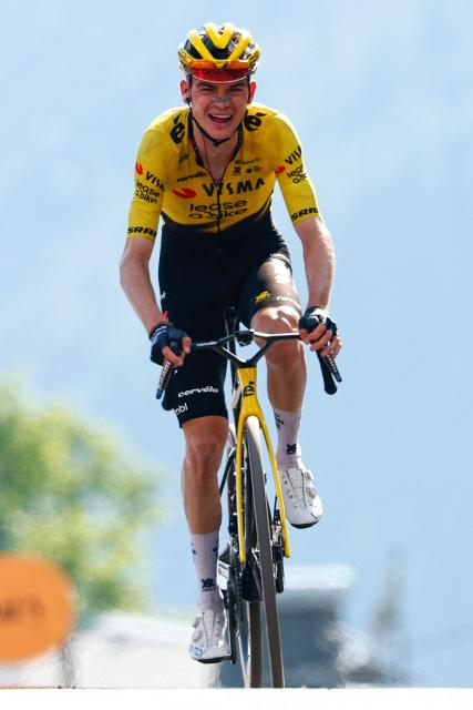 Team Visma Lease a Bike US rider Sepp Kuss celebrates as he crosses the finish line to win the 19th stage of the Giro d'Italia 2026 - Tour of Italy cycling race between Feltre and Alleghe, Italy, on May 29, 2026. (Photo by Luca Bettini / AFP)
