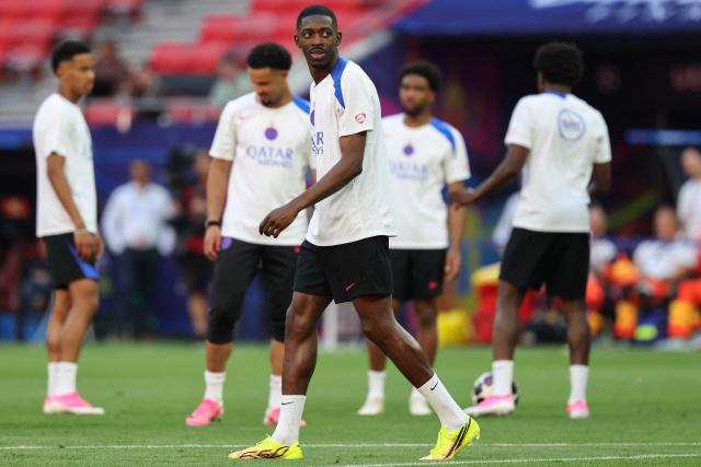 Paris Saint-Germain's players including French forward #10 Ousmane Dembele (C) take part in a MD-1 training session of his players on May 29, 2026, the eve of the UEFA Champions League final football match between Paris Saint-Germain (PSG) and Arsenal at the Puskas Arena in Budapest. Paris Saint-Germain (PSG) face Arsenal in the UEFA Champions League final football match on May 30, 2026 in Budapest. (Photo by FRANCK FIFE / AFP)