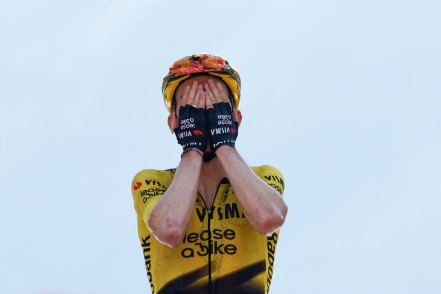 Team Visma Lease a Bike US rider Sepp Kuss celebrates as he crosses the finish line to win the 19th stage of the Giro d'Italia 2026 - Tour of Italy cycling race between Feltre and Alleghe, Italy, on May 29, 2026. (Photo by Luca Bettini / AFP)