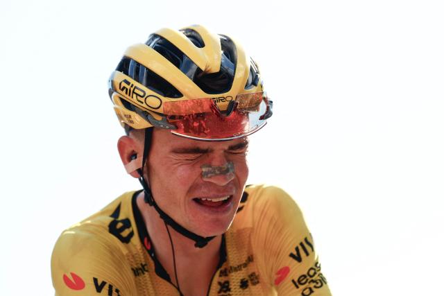 Team Visma Lease a Bike US rider Sepp Kuss celebrates as he crosses the finish line to win the 19th stage of the Giro d'Italia 2026 - Tour of Italy cycling race between Feltre and Alleghe, Italy, on May 29, 2026. (Photo by Luca Bettini / AFP)