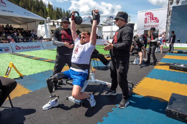 A Ukrainian veteran competes in the Multisport Festival for Veterans in Bukovel, south-western Ukraine on May 29, 2026, amid the Russian invasion of Ukraine. Competitions are held in individual and team formats, combining strength, functional and adaptive elements to allow participants to demonstrate their abilities. The events are designed for war veterans, taking into account varying levels of physical fitness, recovery needs, service experience and rehabilitation requirements. (Photo by Mykola SYNELNYKOV / AFP)