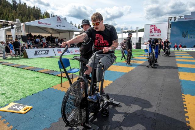Ukrainian veterans compete in the Multisport Festival for Veterans in Bukovel, south-western Ukraine on May 29, 2026, amid the Russian invasion of Ukraine. Competitions are held in individual and team formats, combining strength, functional and adaptive elements to allow participants to demonstrate their abilities. The events are designed for war veterans, taking into account varying levels of physical fitness, recovery needs, service experience and rehabilitation requirements. (Photo by Mykola SYNELNYKOV / AFP)