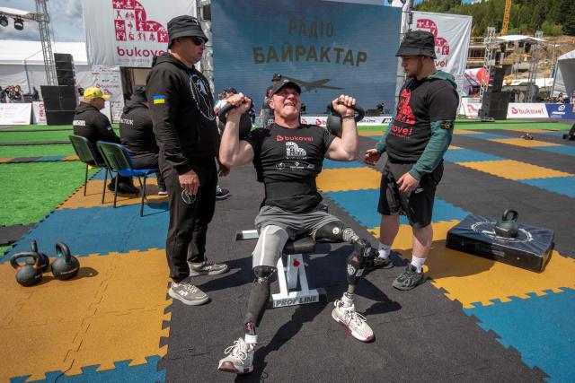 A Ukrainian veteran competes in the Multisport Festival for Veterans in Bukovel, south-western Ukraine on May 29, 2026, amid the Russian invasion of Ukraine. Competitions are held in individual and team formats, combining strength, functional and adaptive elements to allow participants to demonstrate their abilities. The events are designed for war veterans, taking into account varying levels of physical fitness, recovery needs, service experience and rehabilitation requirements. (Photo by Mykola SYNELNYKOV / AFP)